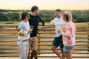 Friends chatting at the camping and glamping site