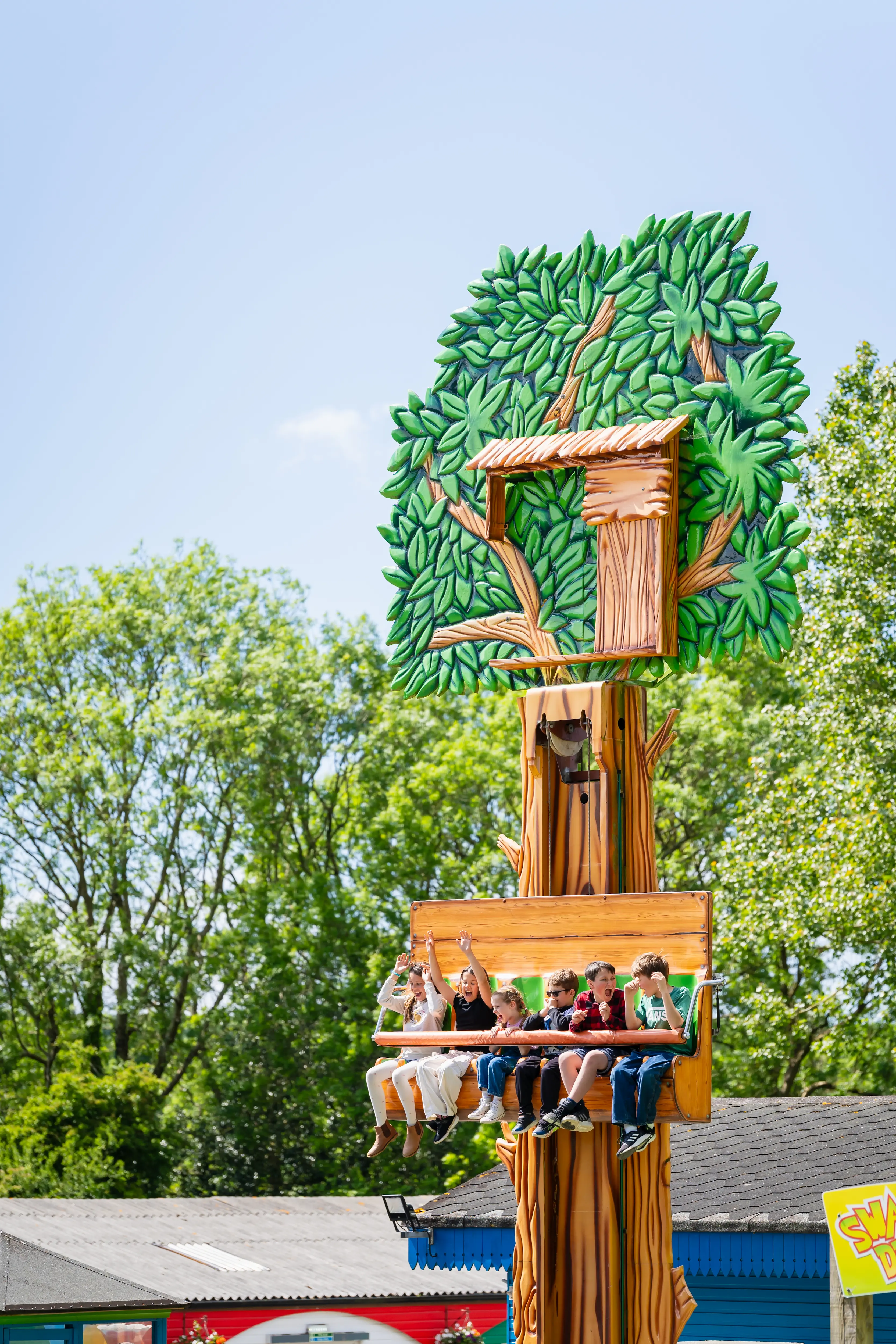 Children on swampys drop ride