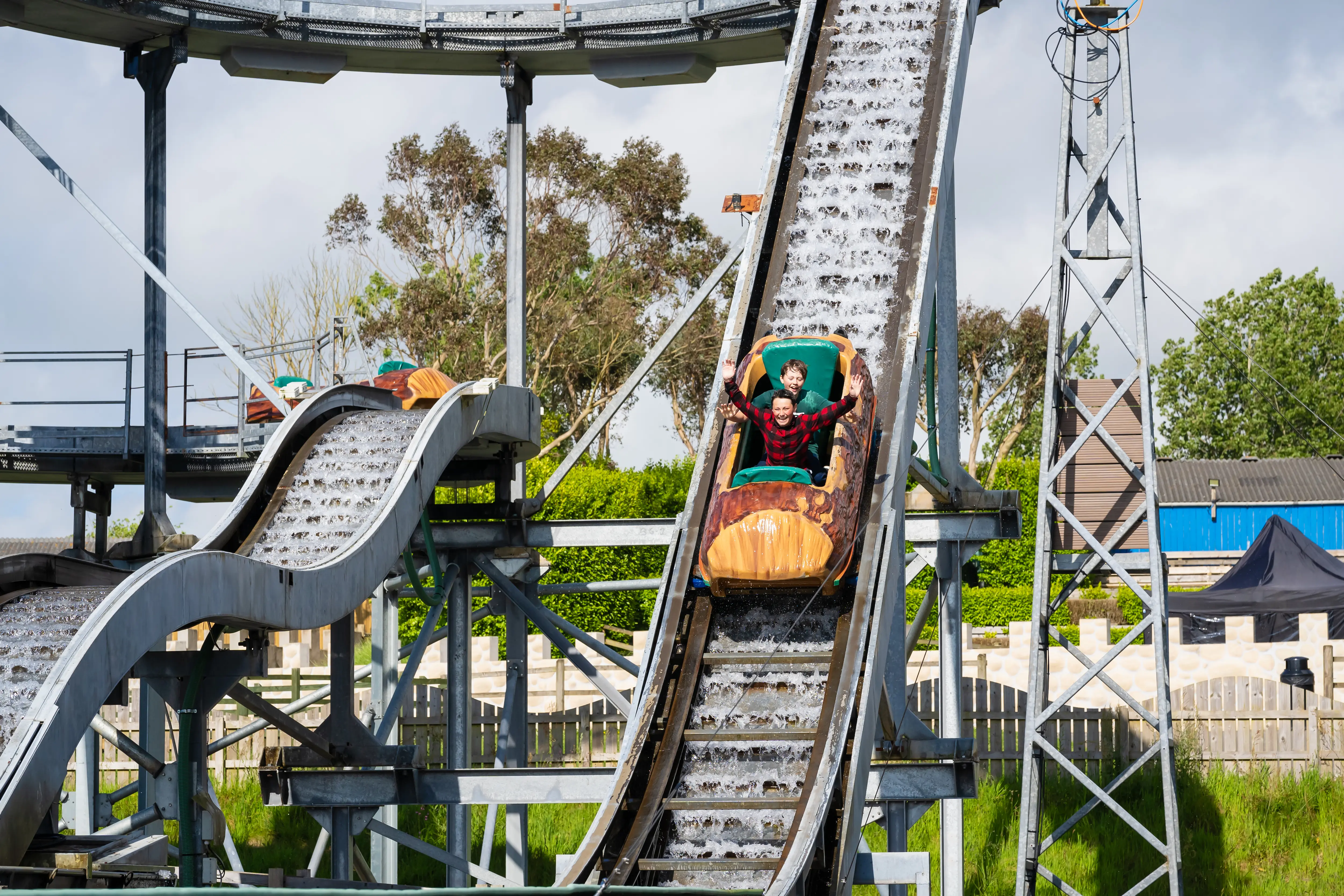2 children on thunder falls water ride