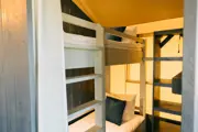 Bunk beds inside a safari lodge 